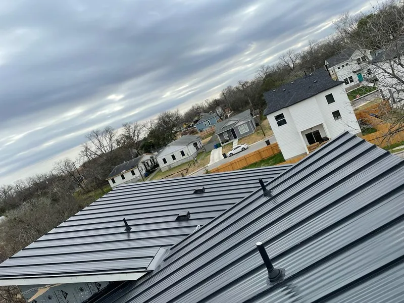 Standing seam metal roof panels with vents for Skylight Repair in Fairview